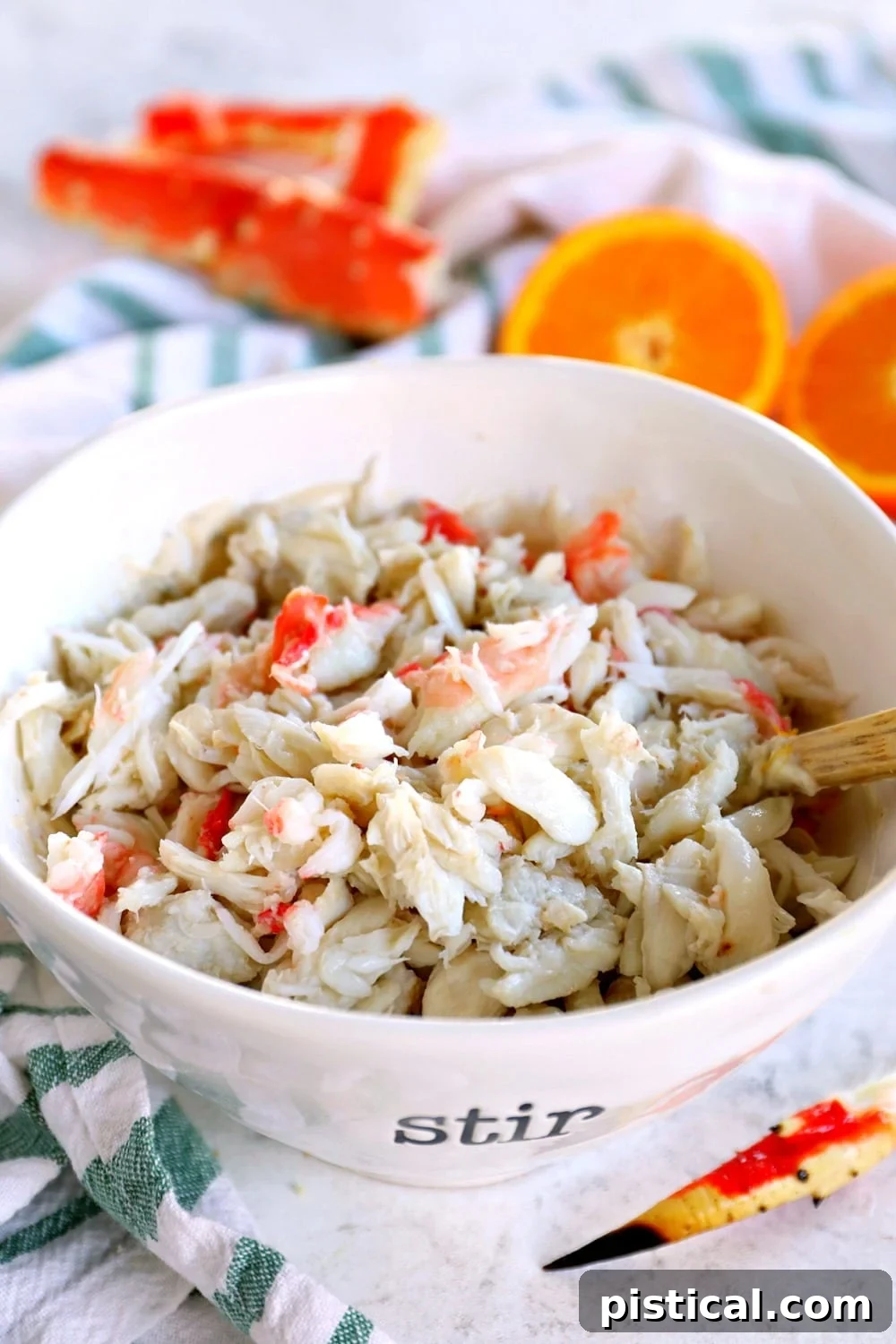 Close-up photograph of pristine, fresh, high-quality lump crab meat, ready to be prepared for delicious crab melts.