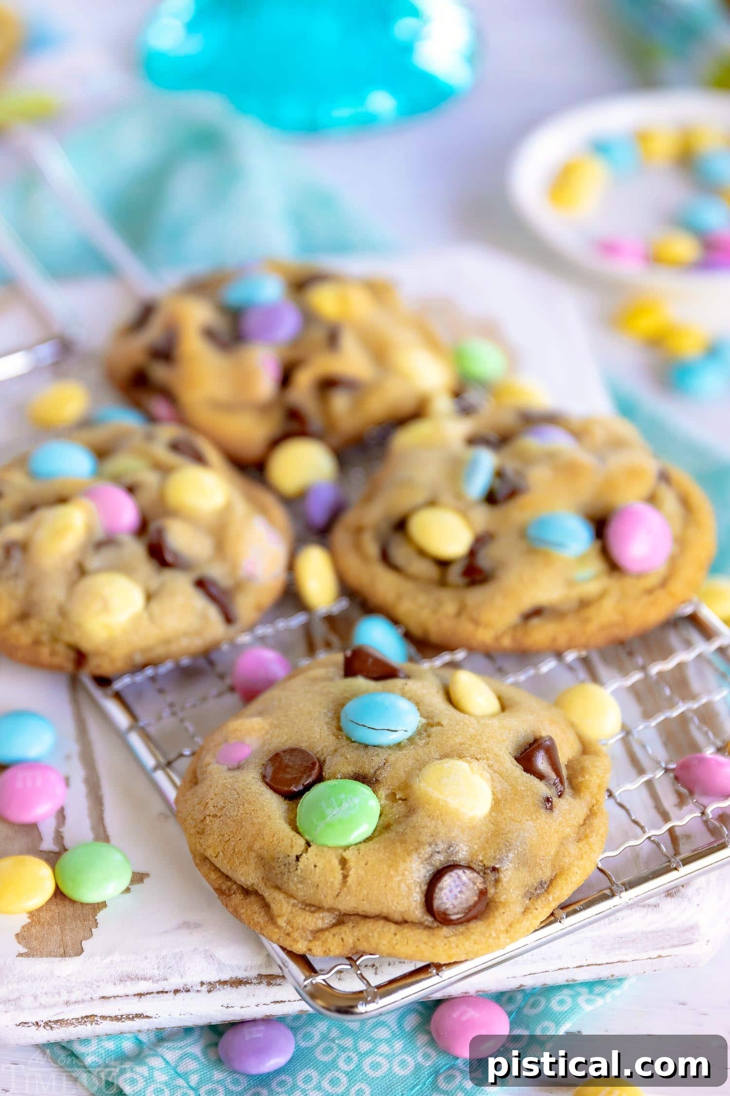 chocolate-chip-cookies-easter-rack - Freshly baked Easter chocolate chip cookies cooling on a wire rack, showing their thick, chewy texture.
