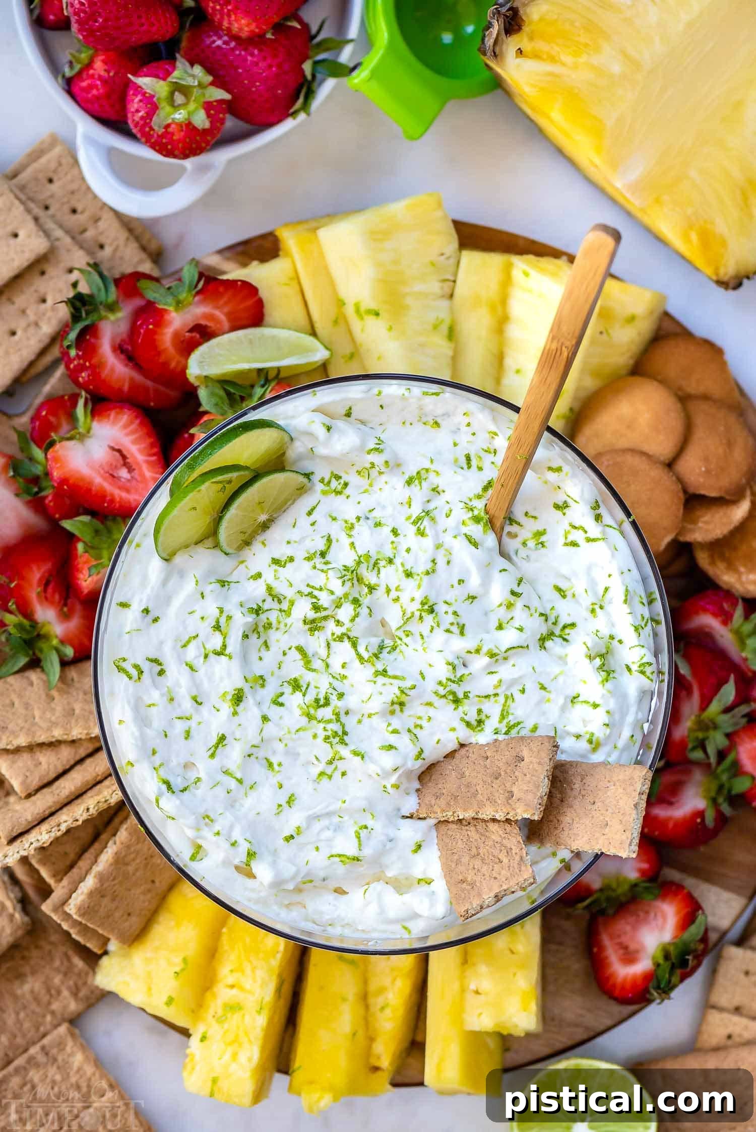 Key Lime Pie Fruit Dip with strawberries, pineapple, and graham crackers