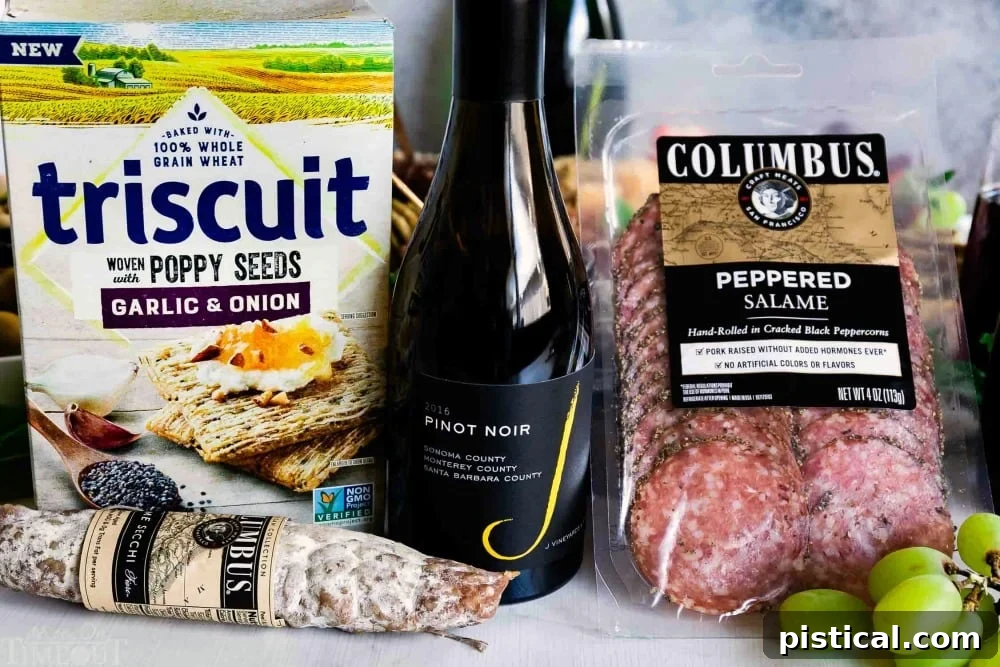 A pairing of Triscuit crackers, Columbus Salami, and J. Winery at an event. Charcuterie board section with Triscuit crackers, J. Winery branding, and Columbus Salami.