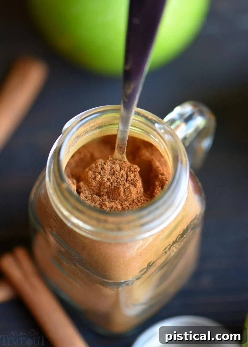 Homemade Apple Pie Spice in Jar with Spoon