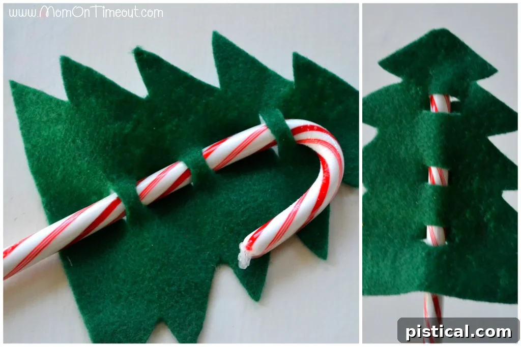 Felt Christmas tree shape with slits, ready for a candy cane to be inserted, showcasing the basic structure.