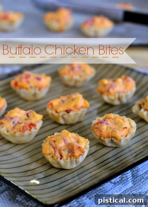 Crispy golden buffalo chicken bites in phyllo cups, ready to serve