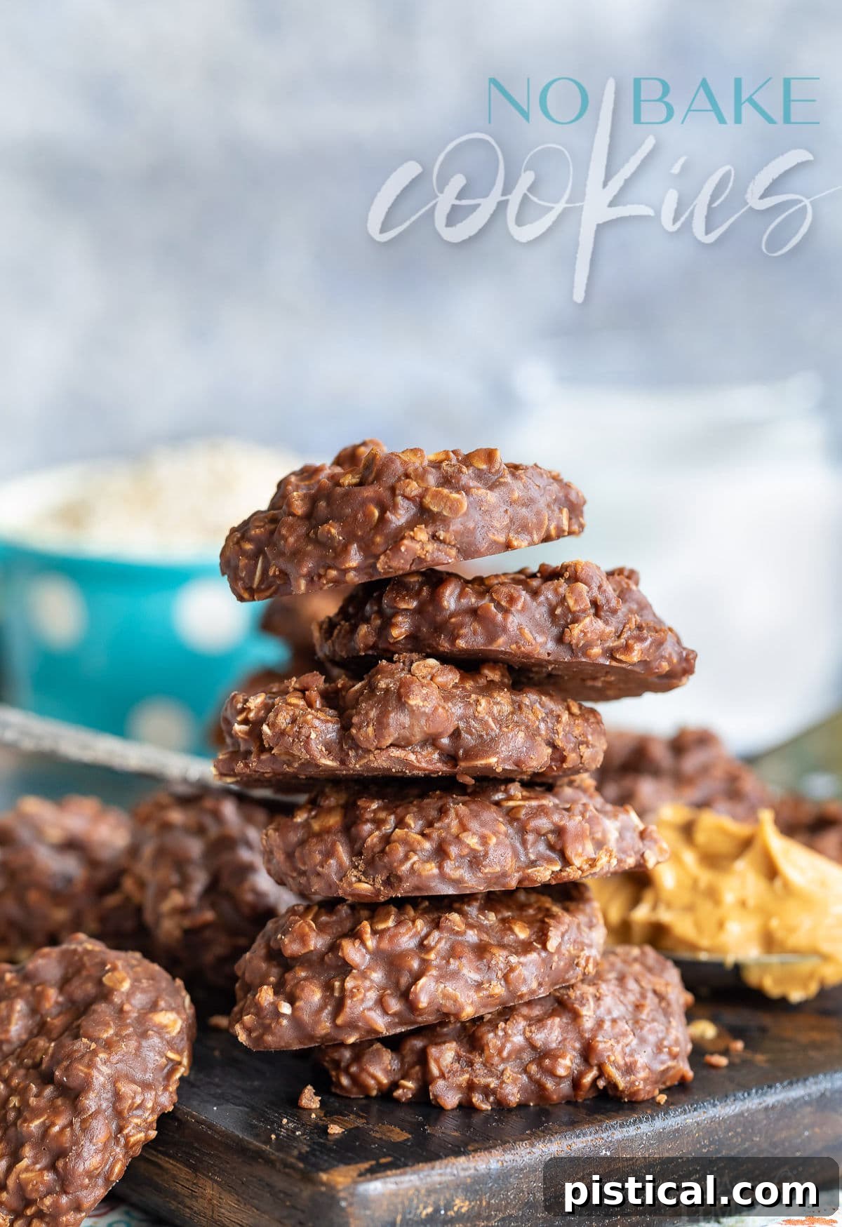 Effortless No-Bake Delights 2 no bake cookies with chocolate oats and peanut butter on a dark cutting board stacked 5 high