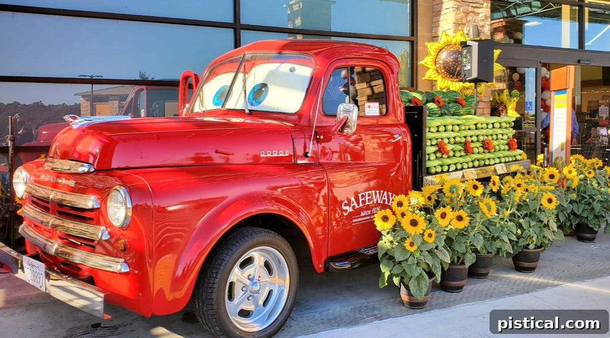 red safeway truck with produce on flatbed of truck in front of store