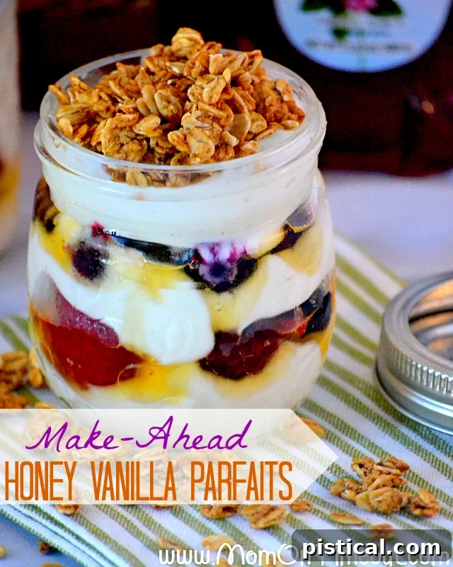 A close-up shot of a perfectly crafted honey vanilla parfait, featuring distinct layers of creamy yogurt, vibrant berries, and golden granola, highlighting its inviting texture and freshness.
