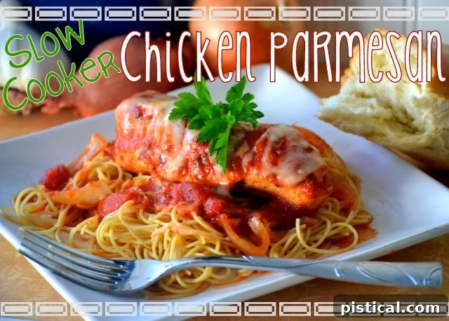 Easy, Cheesy, Slow Cooker Chicken Parmesan | Mom On Timeout - Easy AND Delicious! The perfect weeknight meal! #dinner #chicken #recipe #slowcooker A perfectly plated Easy, Cheesy, Slow Cooker Chicken Parmesan served with spaghetti, ready for a delightful family dinner.