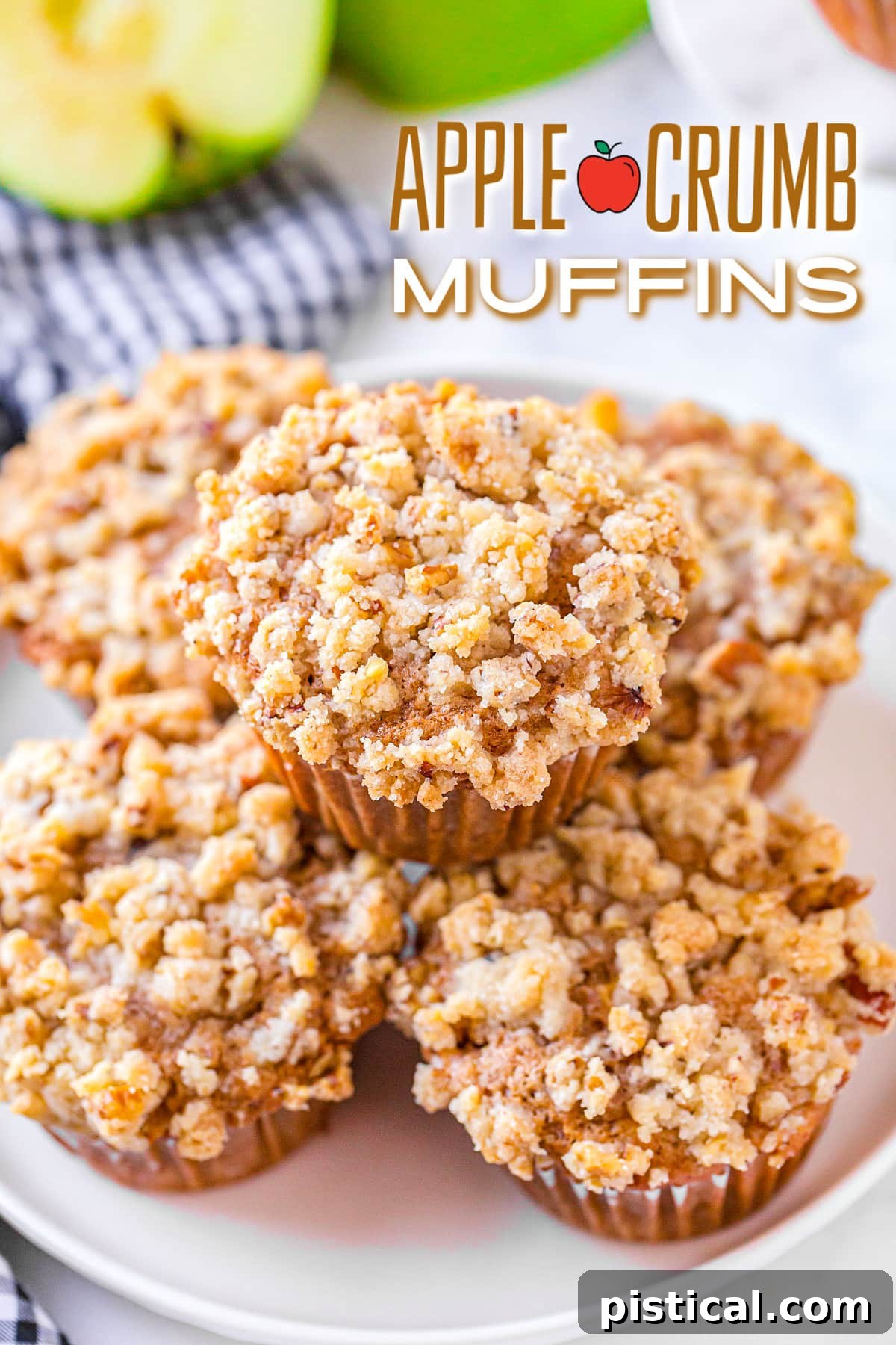five apple crumb muffins on white plate with blue and white napkin beneath plate and text overlay at top
