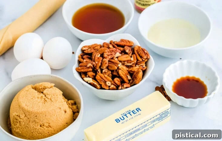 Individual bowls containing all the measured ingredients for maple pecan pie, neatly arranged on a kitchen counter.