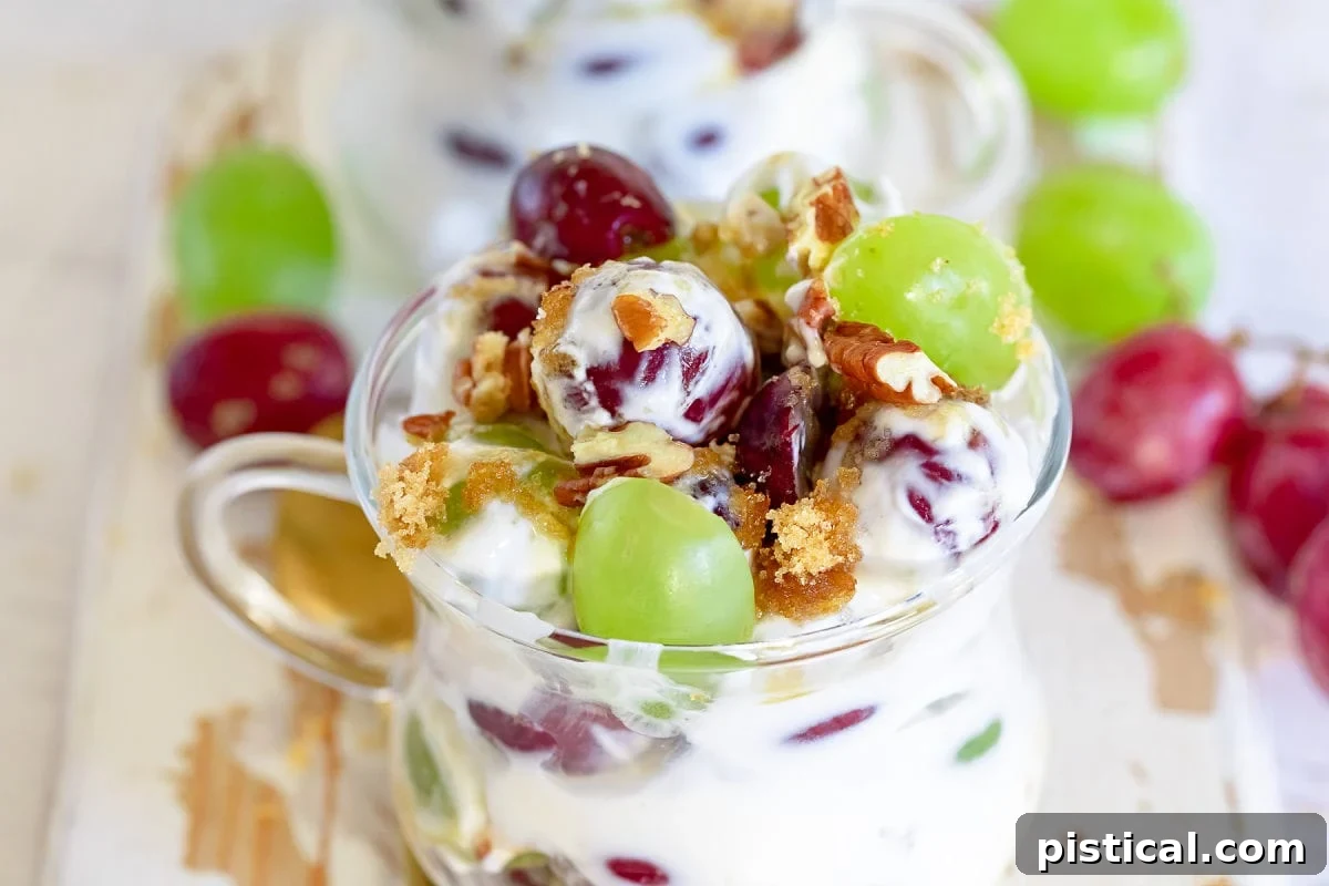 close up look at grape salad in clear small tea cup