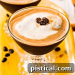 espresso martini recipe in two glasses on yellow glass tray top down view square