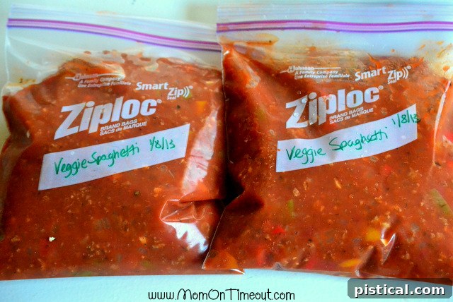 Homemade spaghetti sauce in jars, ready for freezing