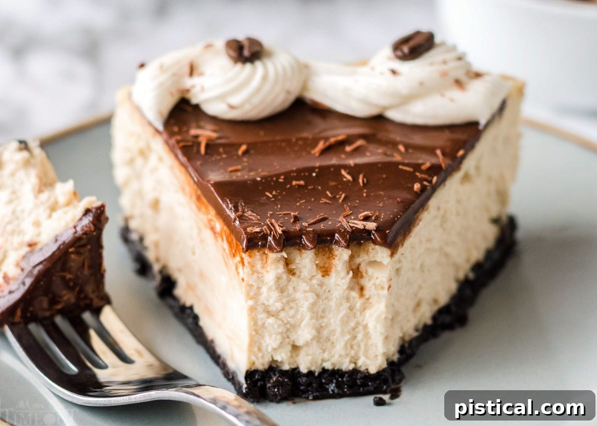 A delectable slice of espresso cheesecake with a small bite removed, served on a pale green plate, highlighting its creamy layers and perfect crust.