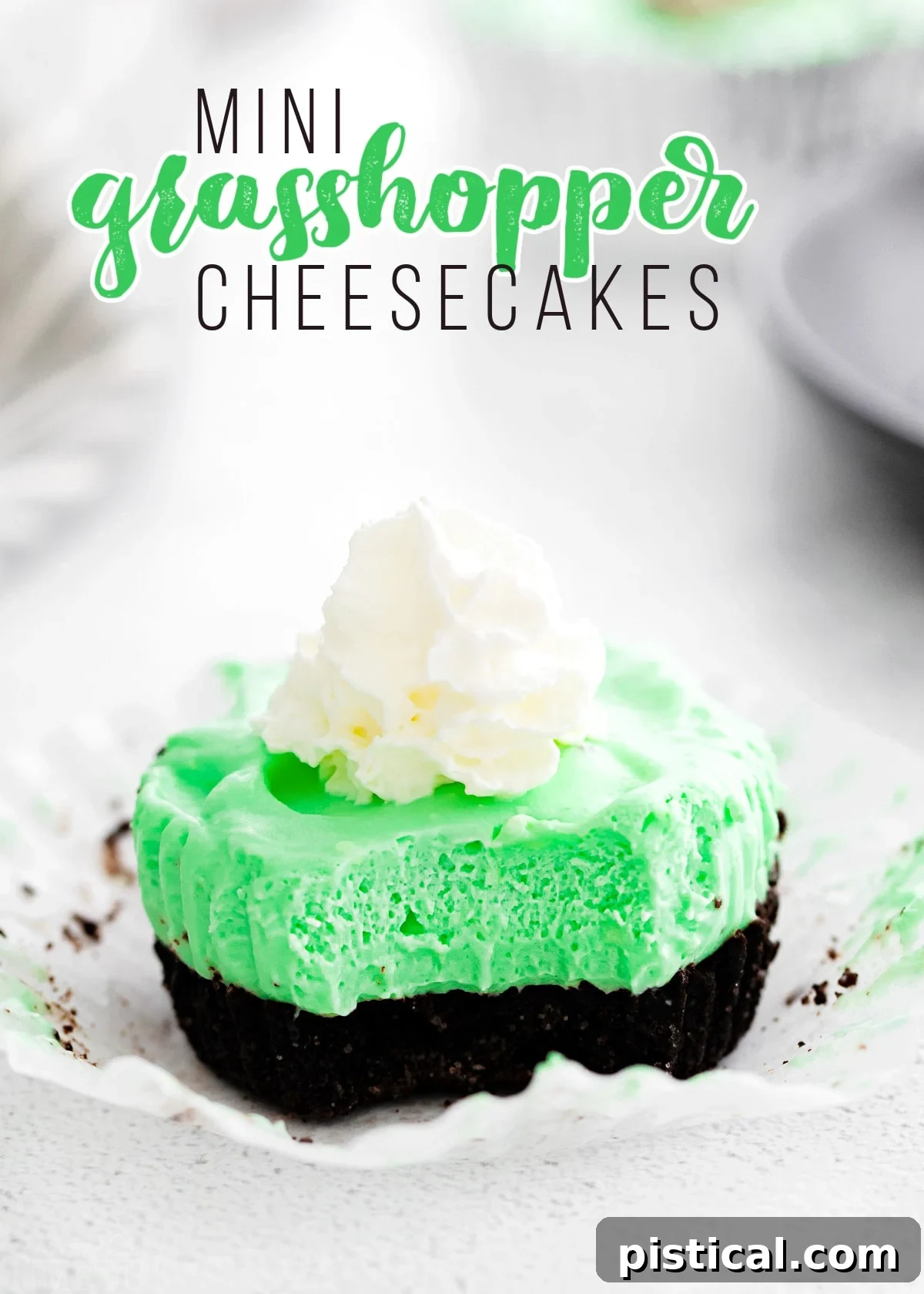 A single Grasshopper Mini Cheesecake, unwrapped and beautifully presented on a pristine white surface with a title overlay, showcasing its vibrant green hue and creamy texture.