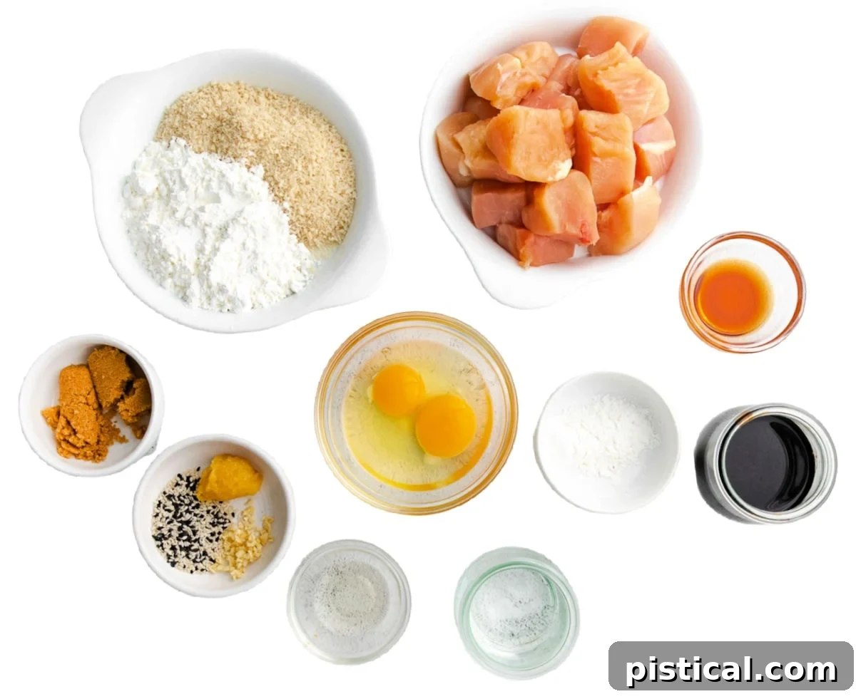 Individual ingredients for homemade teriyaki chicken carefully measured into small white bowls, ready for preparation.