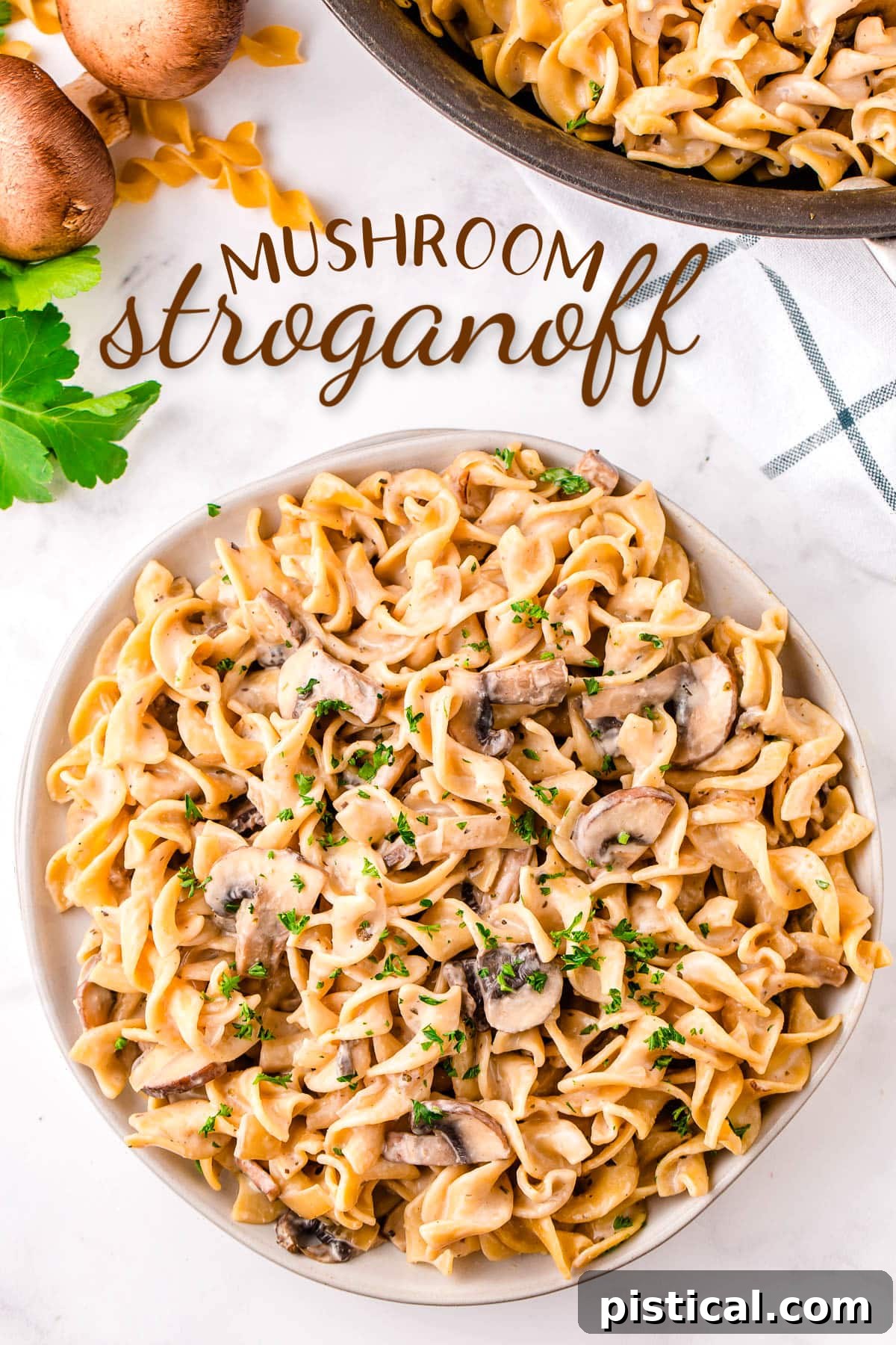top down view of mushroom stroganoff piled high on round white plate garnished with parsley. text overlay at top of image.