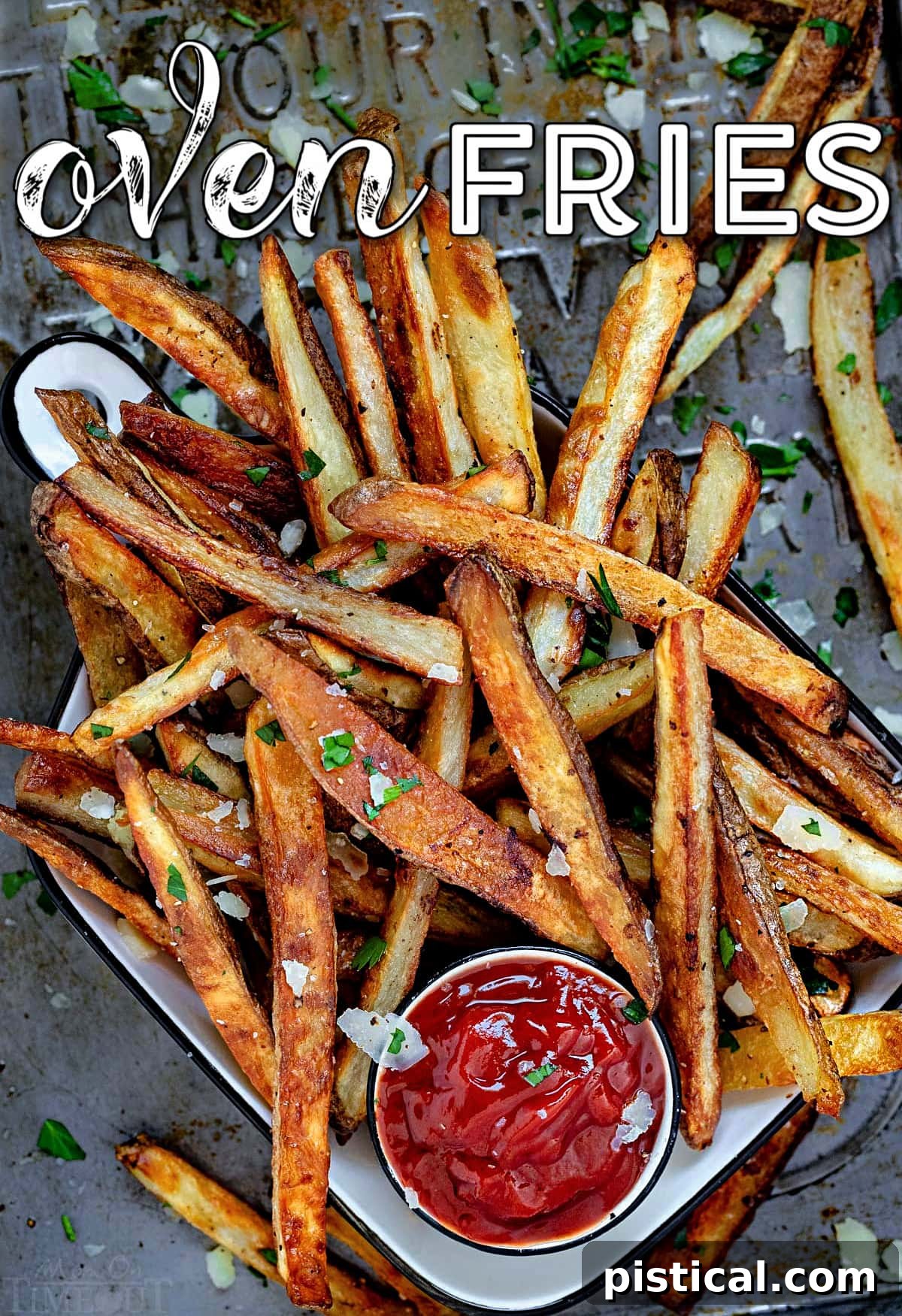 pile of oven fries on baking sheet with small bowl of ketchup. title overlay on top of image.