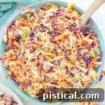 Cole slaw in blue bowl ready to serve.