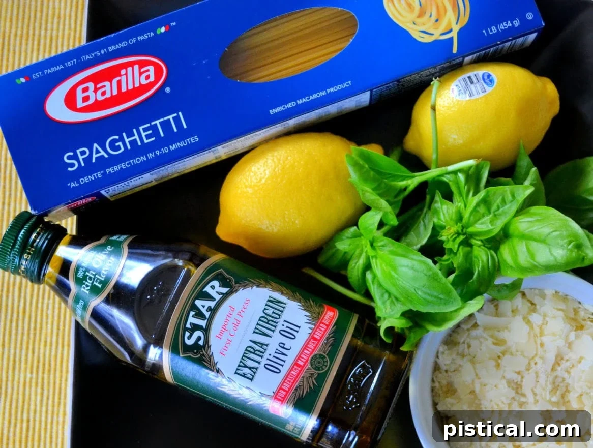 Zesty Lemon Pasta 3 lemon spaghetti ingredients laid out on board