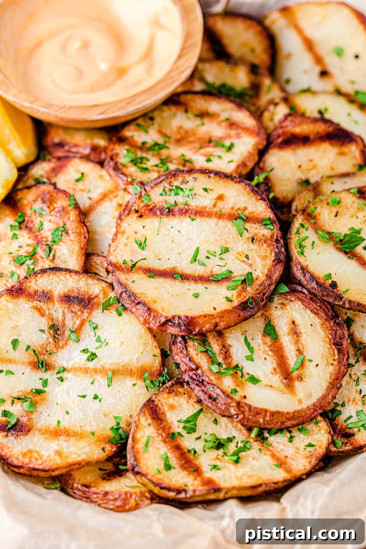 potatoes with grill marks cut into slices.