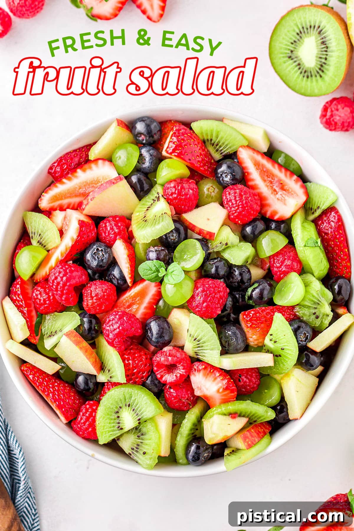 Nature's Candy Bowl 2 A vibrant fruit salad featuring kiwis, strawberries, grapes, and more, presented in a white bowl with a title overlay, ready to be served.