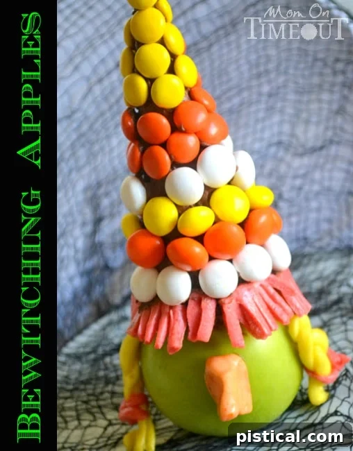 Bewitching Apples - A fun Halloween treat from MomOnTimeout.com Adorable Bewitching Apple Witches with green apple heads and candy hats, a fun Halloween treat idea.