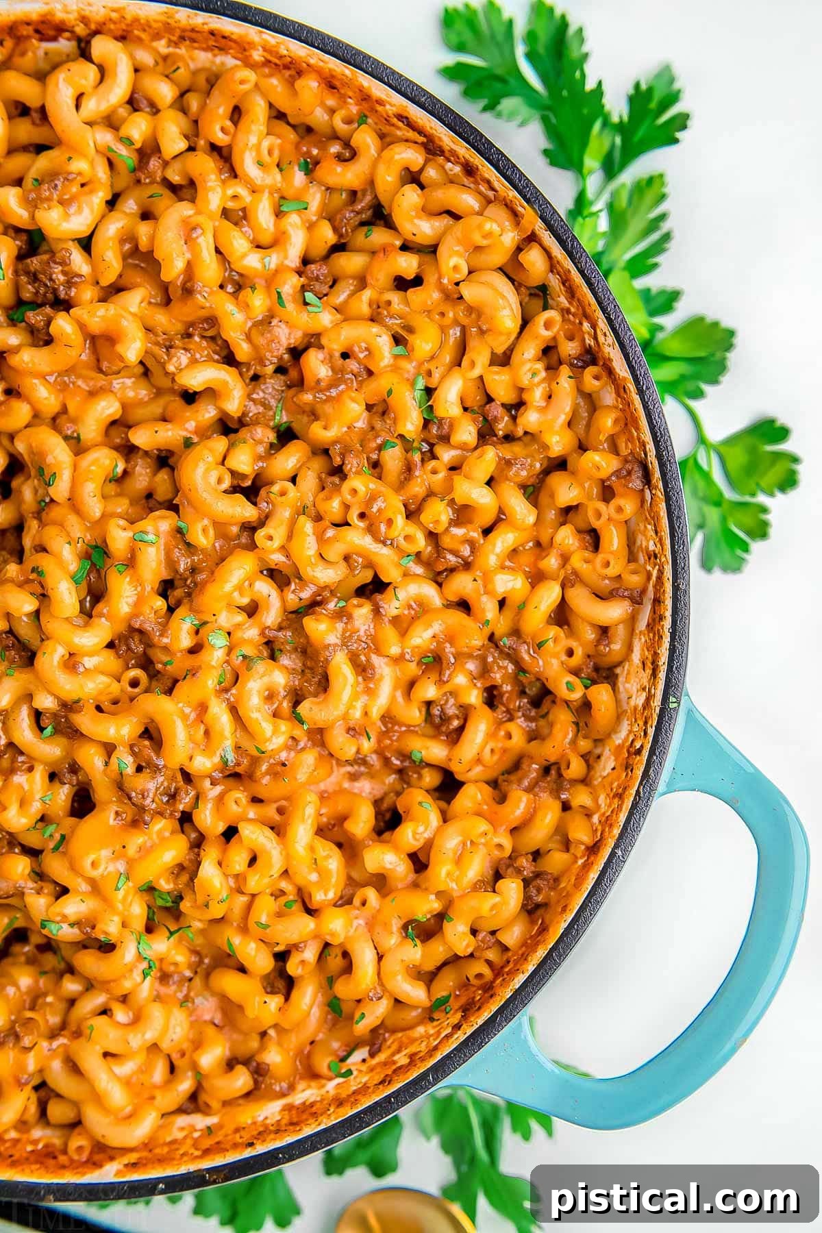 close up look at hamburger helper in large skillet ready to be served.