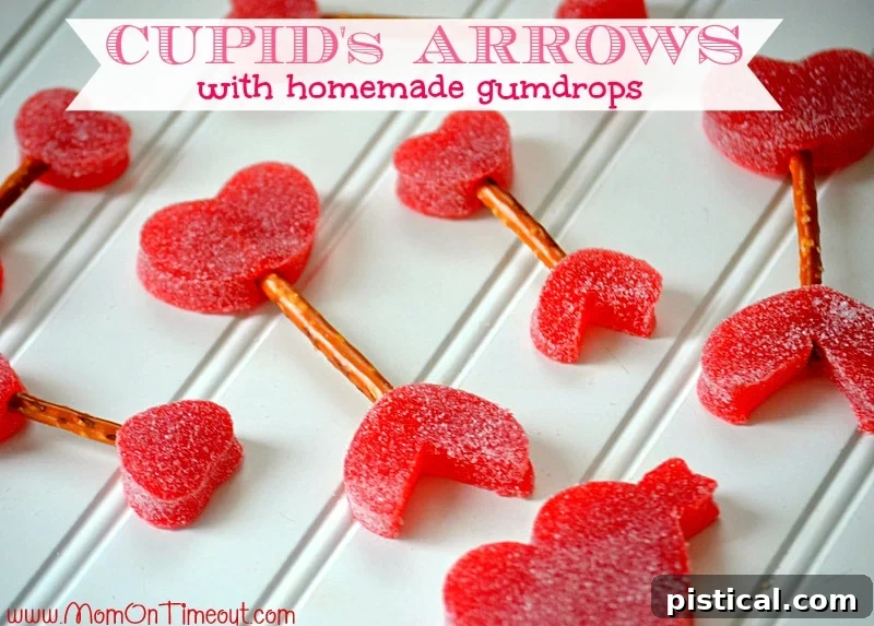 A delightful arrangement of finished Cupid's Arrows made from homemade gumdrops and pretzels, ready to be enjoyed as Valentine's Day sweets