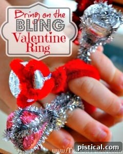 A dazzling 'Bring on the Bling Valentine Ring' craft for kids, made with pipe cleaners and sparkling gems