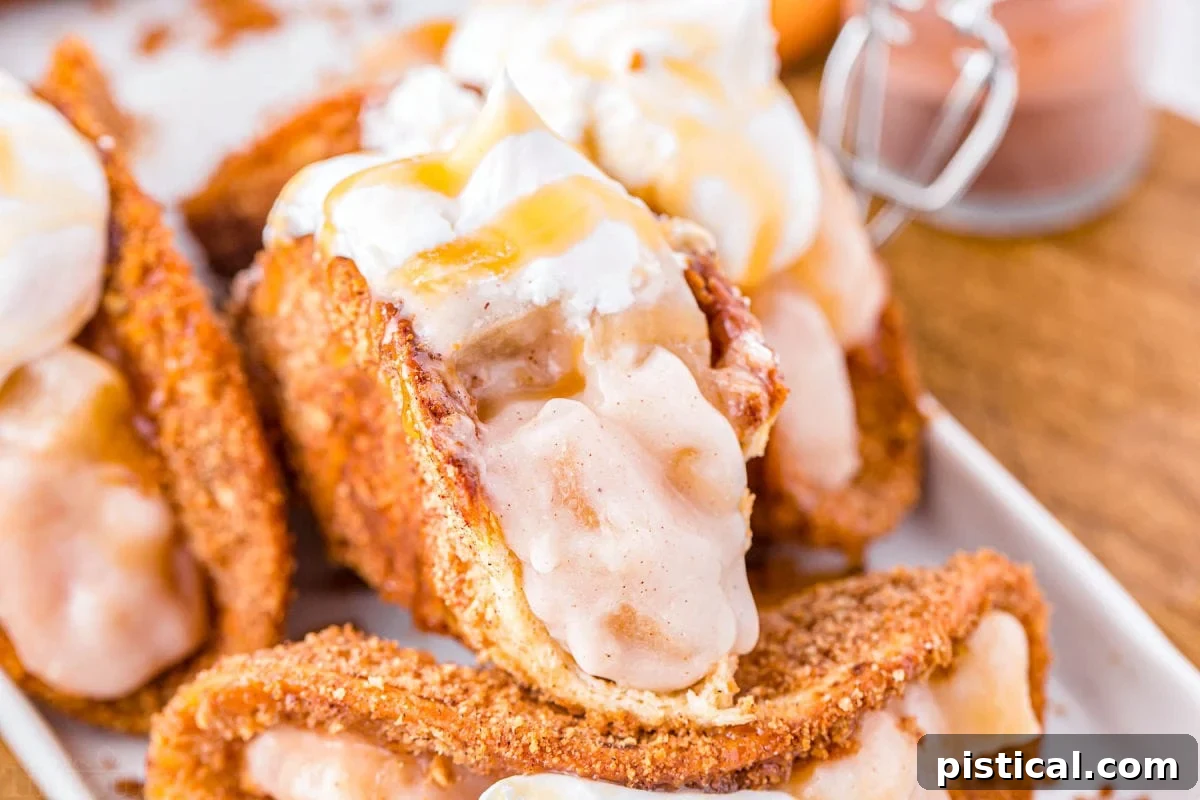 Cinnamon Apple Taco Treats 5 apple taco with bite taken so you can see the creamy apple pie filling.