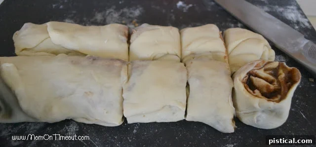 Sticky buns arranged in a round baking pan