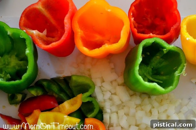 Chopped bell pepper tops and onion ready for sauteing