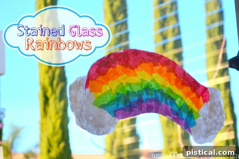 Finished Stained Glass Rainbows craft hanging on a window, sparkling in the sunlight for St. Patrick's Day.