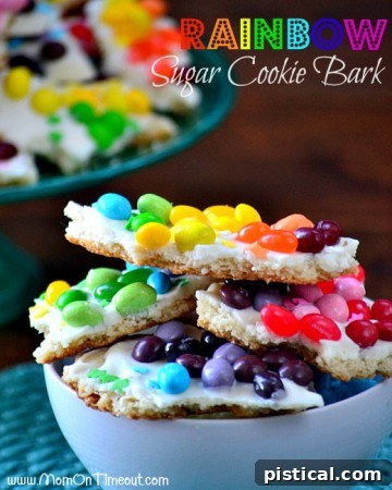 Rainbow Sugar Cookie Bark - a festive and easy layered dessert with colorful sugar cookie pieces, ideal for sharing.