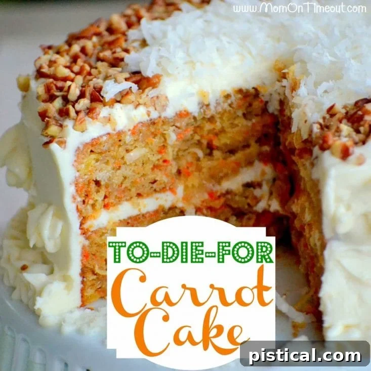 Decorated carrot cake on a cake stand with a slice removed