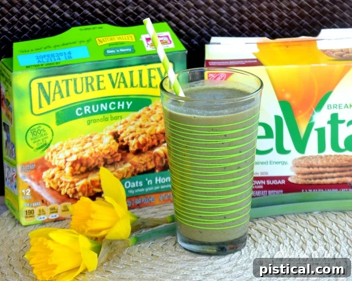 Nature Valley Granola Bars and BelVita Breakfast Biscuits paired with green smoothies as convenient on-the-go breakfast solutions for busy families.