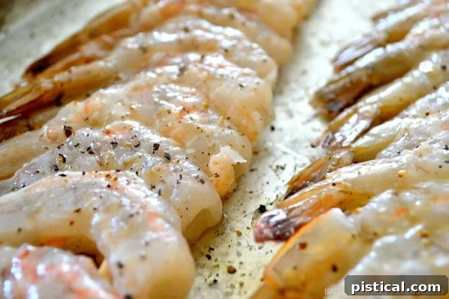 Skewered shrimp marinating in a bowl with lime juice, olive oil, salt, and pepper