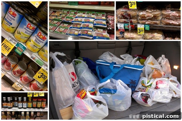 A shopping cart filled with fresh groceries, including Dole pineapple, ready for meal preparation.