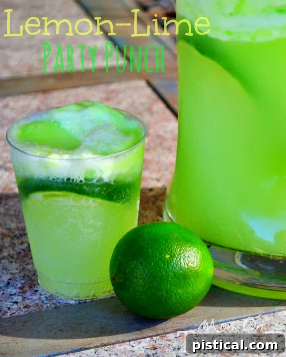 Lemon Lime Party Punch | MomOnTimeout.com Made with lime sherbet this punch is always a crowd pleaser! #beverage #punch Refreshing Lemon Lime Party Punch made with lime sherbet and lemon-lime soda, perfect for any party or themed celebration. Garnished with fresh lime slices.