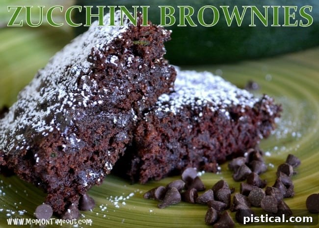 Amazing Zucchini Brownies | MomOnTimeout.com Zucchini Brownies dusted with powdered sugar