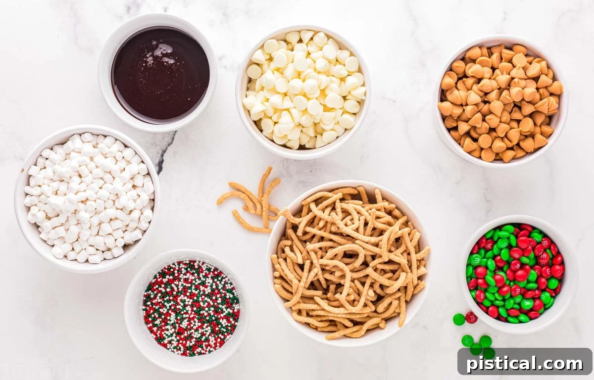 A top-down view of Buddy the Elf cookie ingredients meticulously measured into small bowls, ready for assembly.