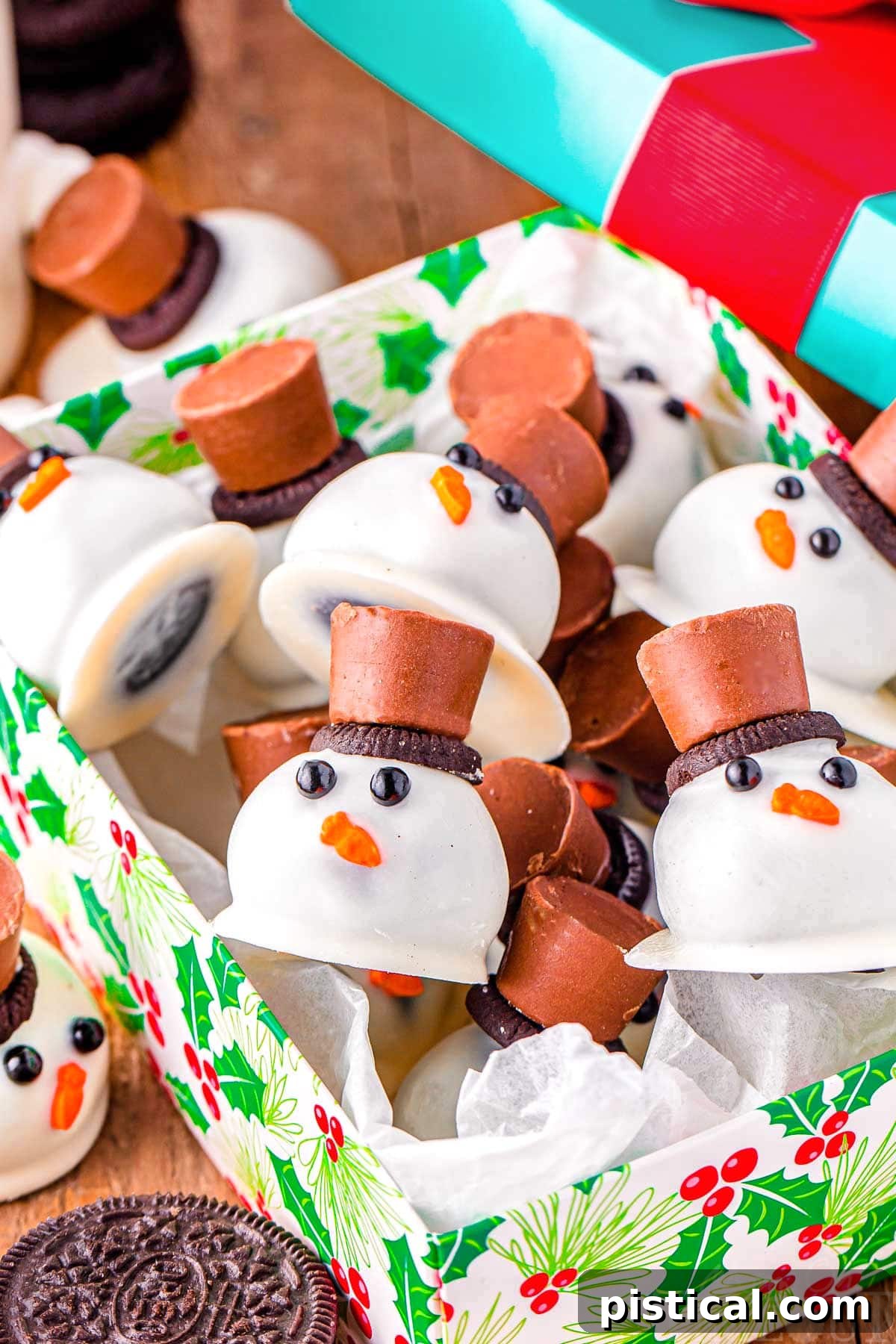 Melting Snowman Oreo Truffles 6 snowman oreo balls in a christmas box ready to be enjoyed.