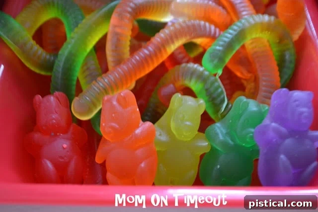 Ice cream topping station with gummy bears and other treats