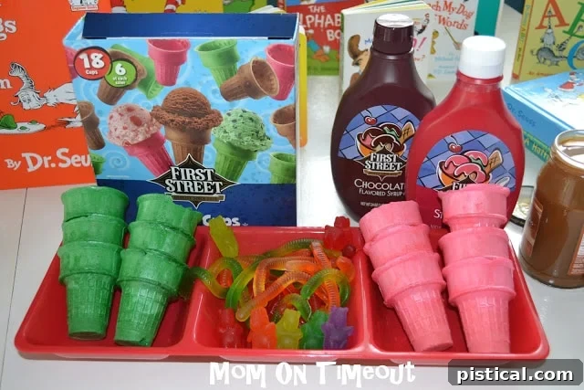 Ice cream topping bar with syrups, whipped cream, and fresh fruit