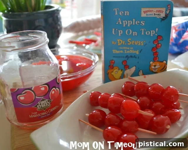 Maraschino cherries on picks, resembling Ten Apples Up On Top
