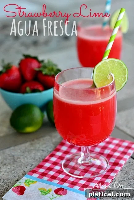 Vibrant Strawberry Lime Agua Fresca, a perfect refreshing summer drink for any occasion.