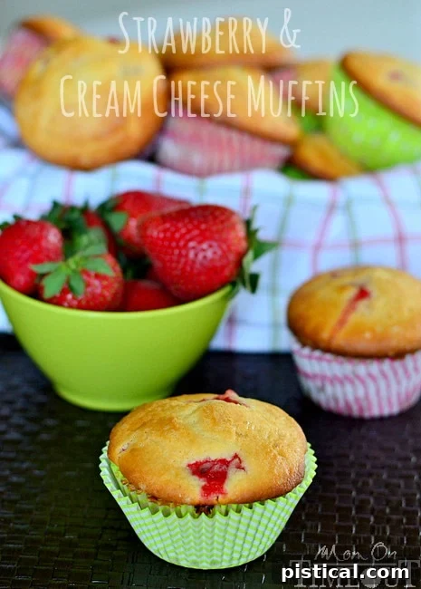 Delicious Strawberry & Cream Cheese Muffins, perfect for a cozy breakfast or brunch. Soft, moist, and bursting with fresh fruit flavor. #strawberrymuffins #creamcheesemuffins #breakfastrecipes