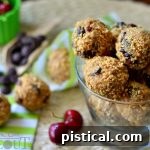 Chocolate Cherry Peanut Butter Energy Bites 2 A small pile of finished Dark Chocolate Cherry Peanut Butter Oat Bites
