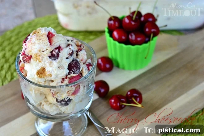 A close-up of Cherry Cheesecake Magic Ice Cream with a rich, creamy texture, showing off the vibrant cherry pieces and golden graham cracker swirls. Perfect for a no-machine ice cream lover.