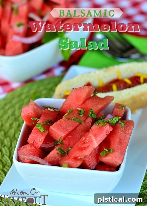 A beautifully plated serving of Balsamic Watermelon Salad with fresh mint garnish, ready to be enjoyed.